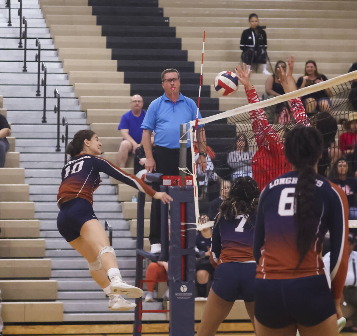 Legacy's Jocelyn Taveras (10) sends the ball over as Liberty defenders make the block during a ...