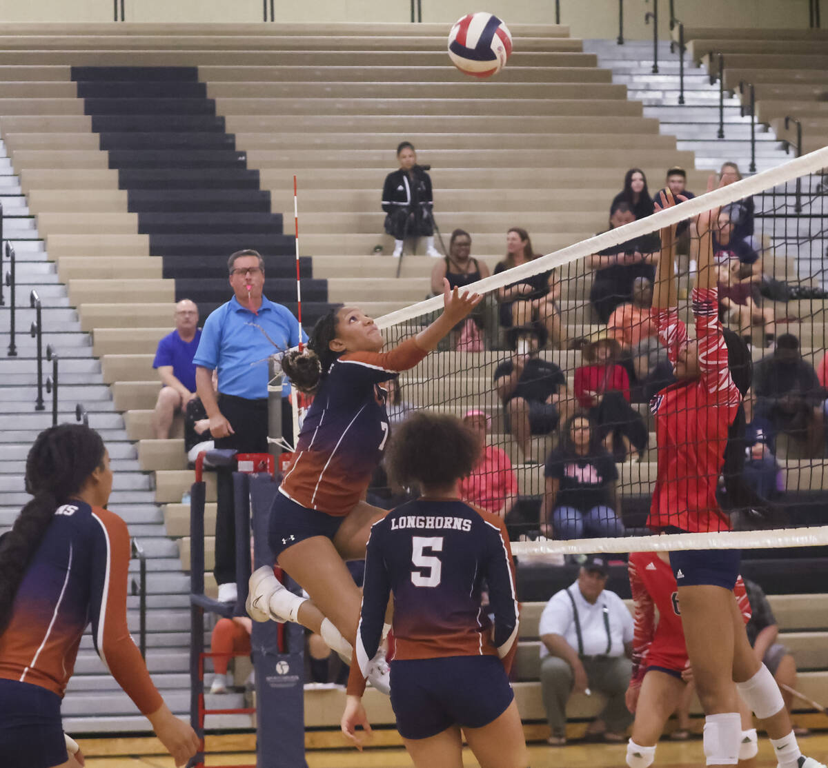 Legacy's Kiana Peterson (7) eyes the ball as Liberty defends during a volleyball game at Legacy ...