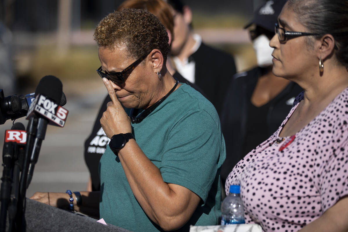 Nevada State Sen. Pat Spearman, left, surrounded by friends, family and supporters, holds a pre ...