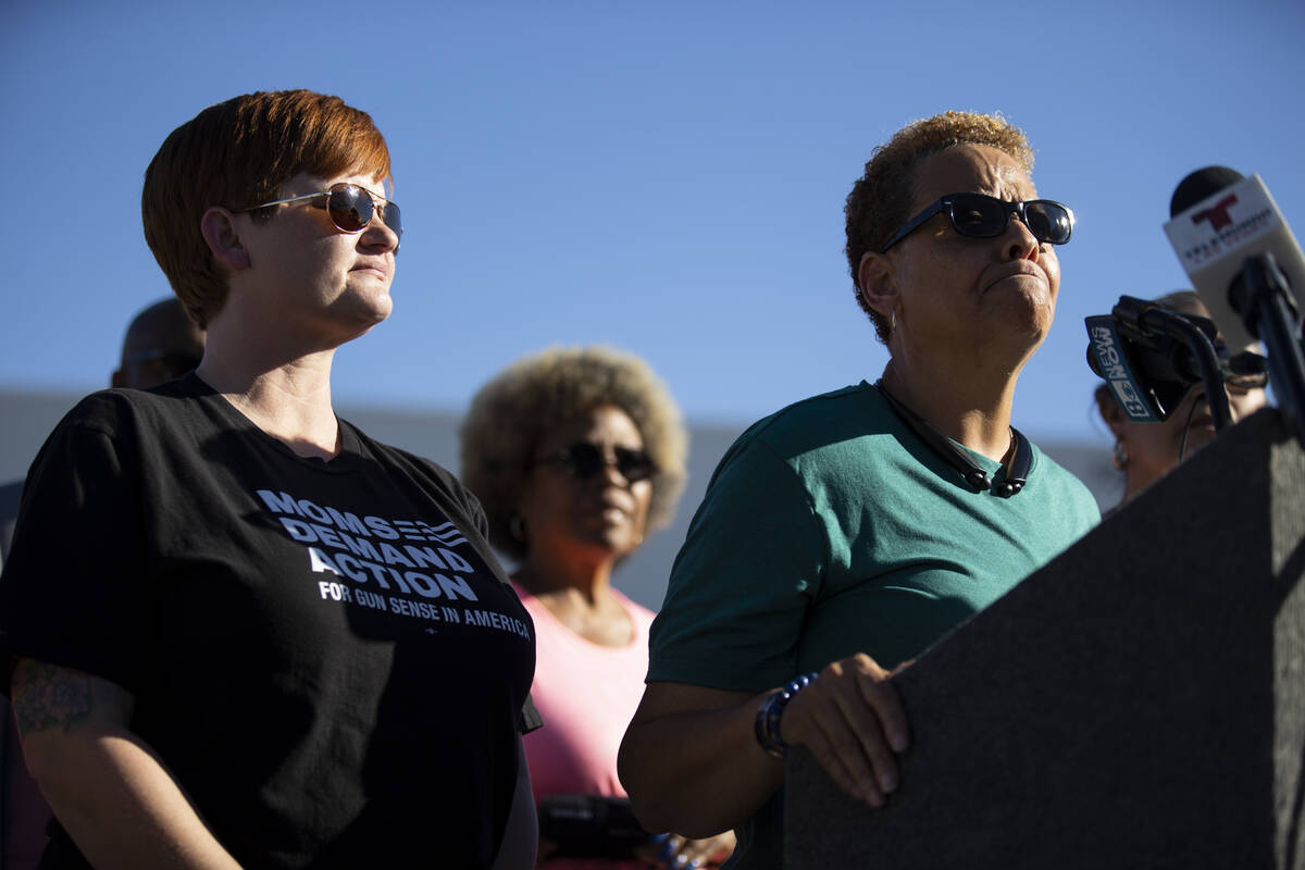 Nevada State Sen. Pat Spearman, right, surrounded by friends, family and supporters, holds a pr ...
