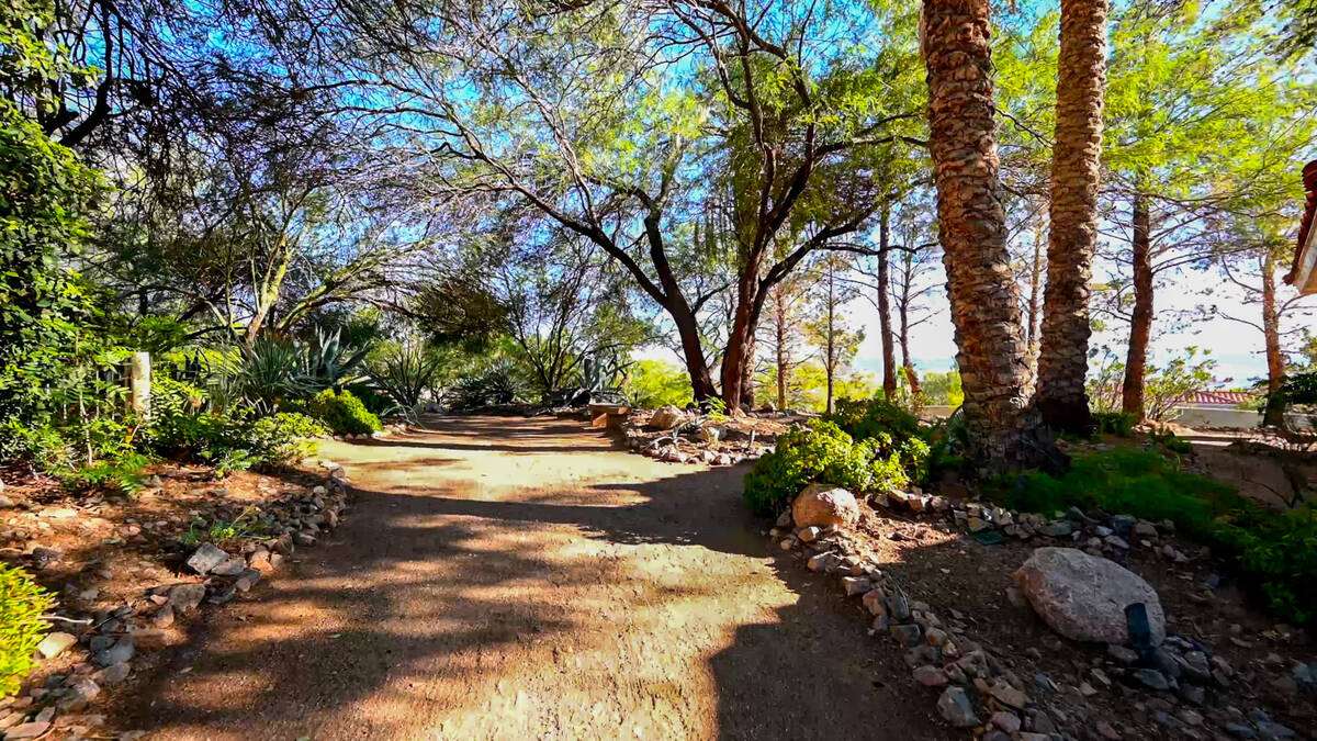 The 3.76-acre Boulder City compound has walking paths throughout the wooded area. (Desert Sun R ...
