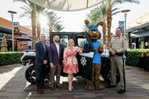 Celebrating the vehicle donation are, from left, Tom Kovach, executive director, LVMPD Foundati ...