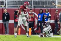 Alabama defensive back Eli Ricks (7) reacts after defending against Mississippi State wide rece ...