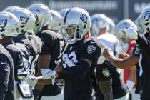 Raiders cornerback Anthony Averett (29) stretches during the team’s training camp practi ...