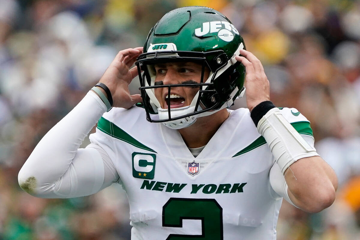 New York Jets' Zach Wilson calls a play during the first half of an NFL football game Sunday, O ...