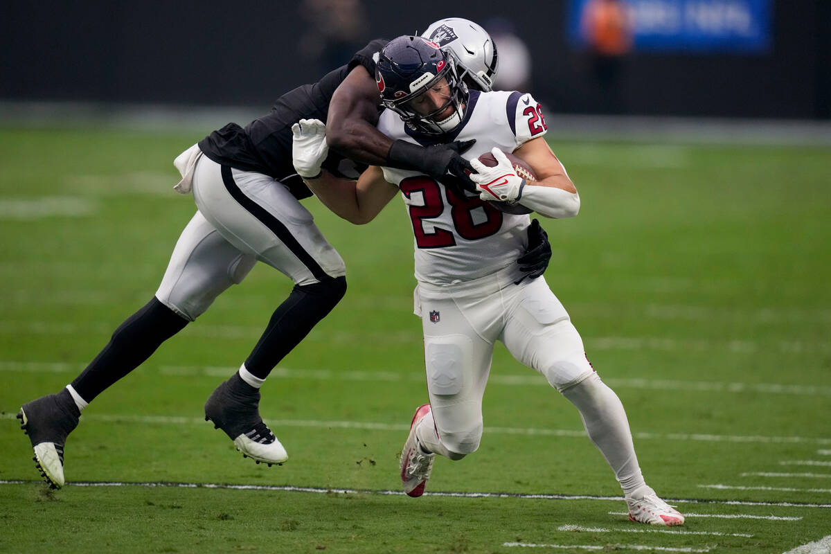 Houston Texans running back Rex Burkhead runs with the ball during the second half of an NFL fo ...