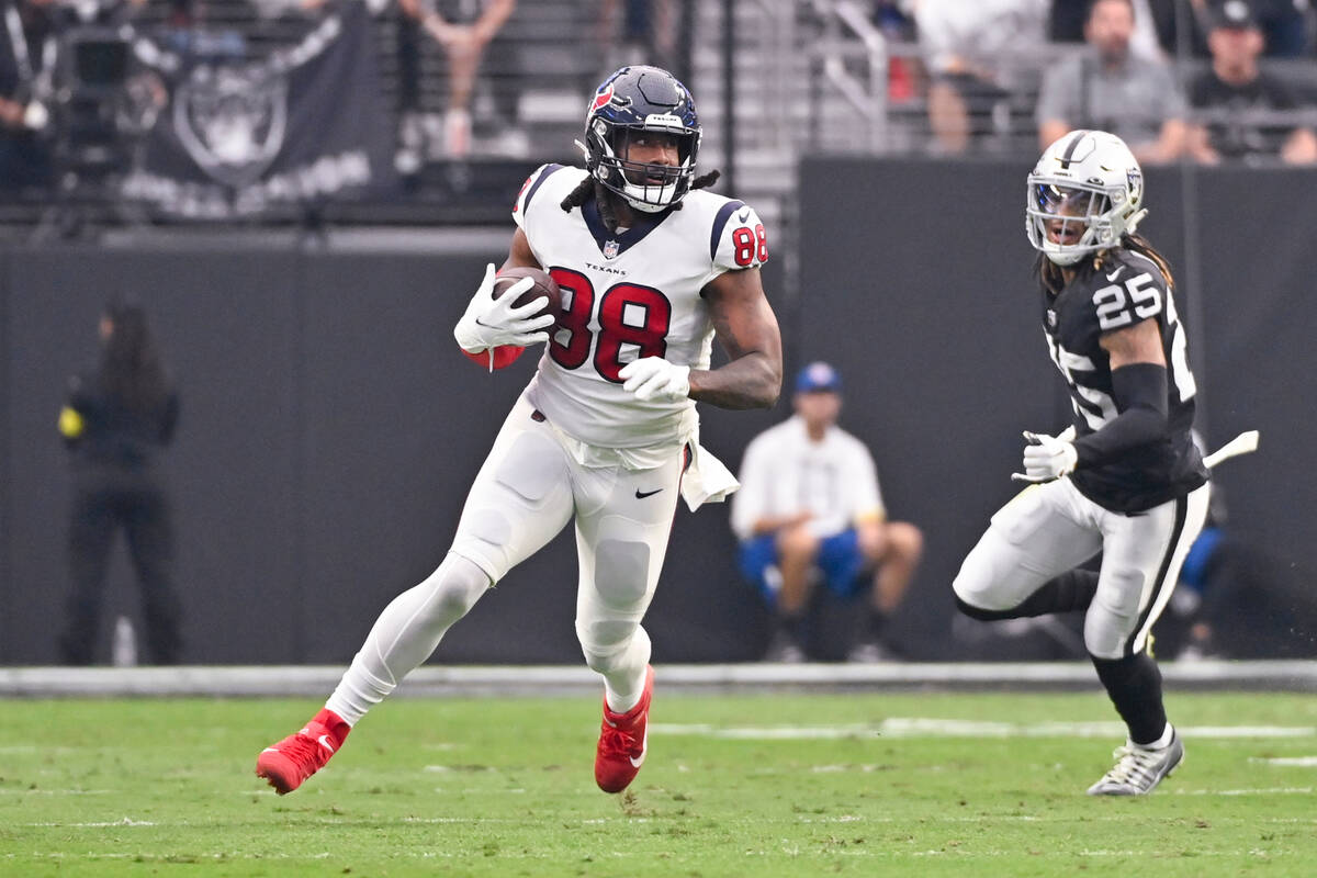 Houston Texans tight end Jordan Akins runs with the ball during the second half of an NFL footb ...