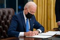 FILE - In this Feb. 2, 2021, file photo President Joe Biden signs an executive order on immigra ...