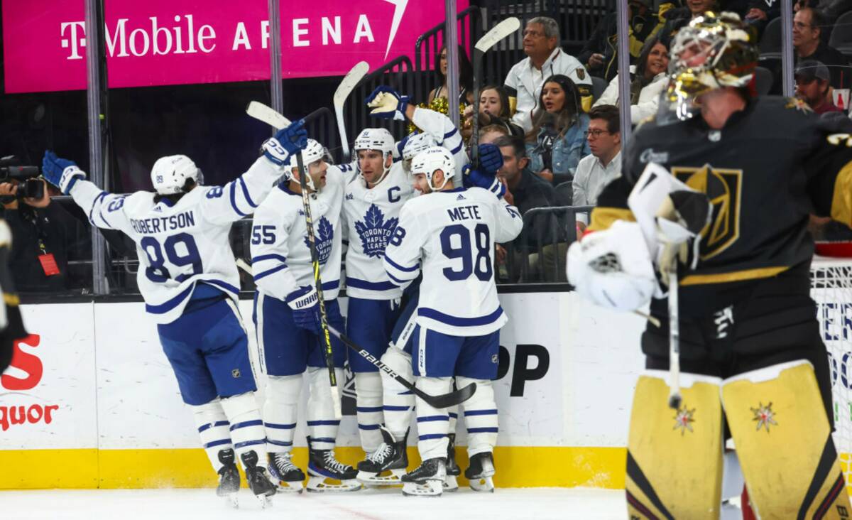 Toronto Maple Leafs right wing William Nylander, third from left, celebrates his goal against t ...