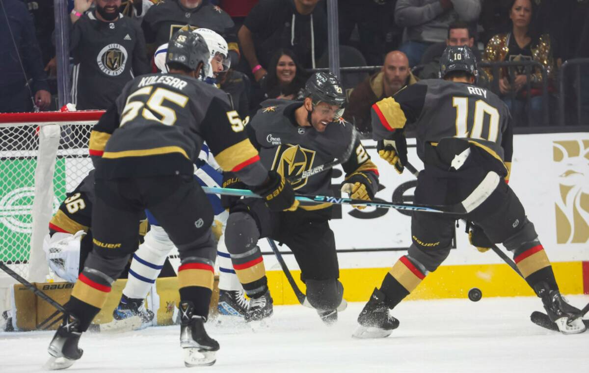 Vegas Golden Knights defenseman Alec Martinez (23) eyes the puck while defending the net agains ...