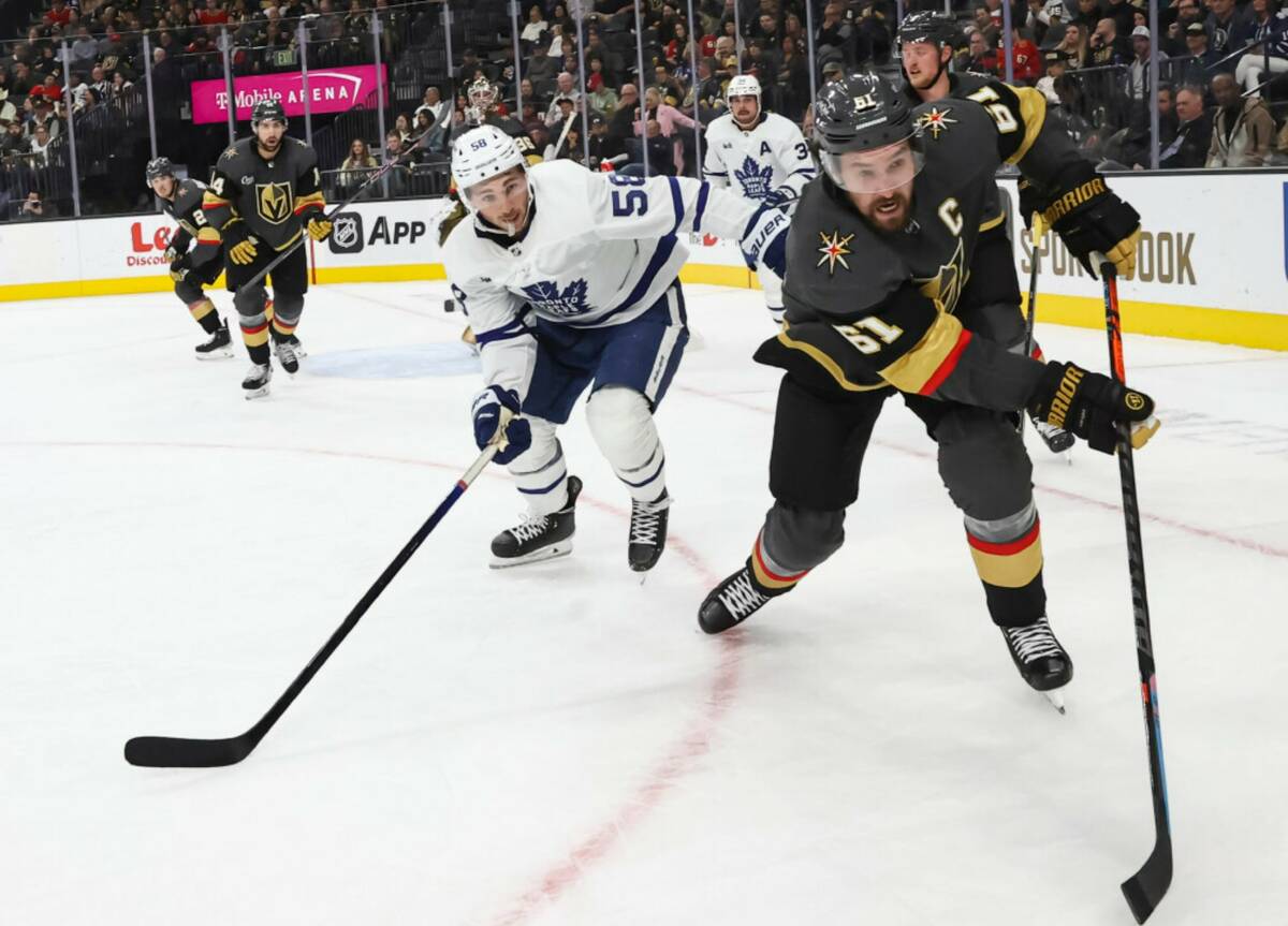 Vegas Golden Knights right wing Mark Stone (61) chases after the puck in front of Toronto Maple ...