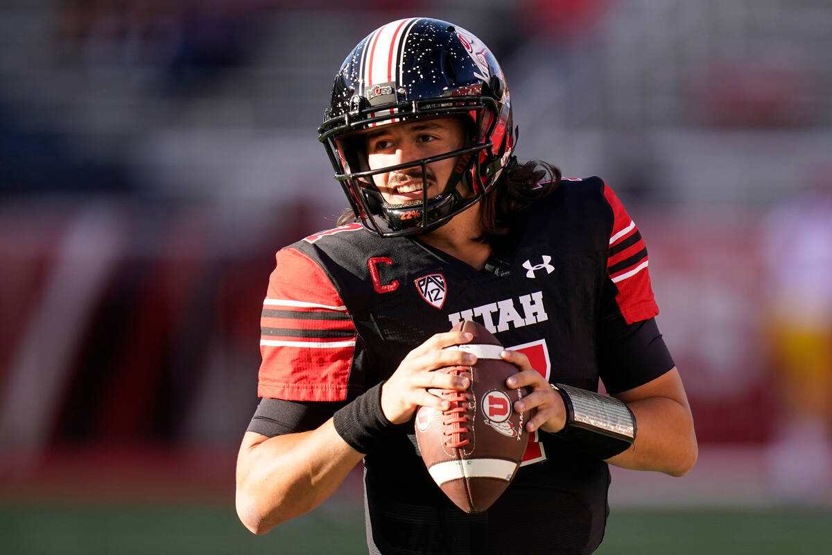 Utah quarterback Cameron Rising (7) warms up before their NCAA college football game against So ...