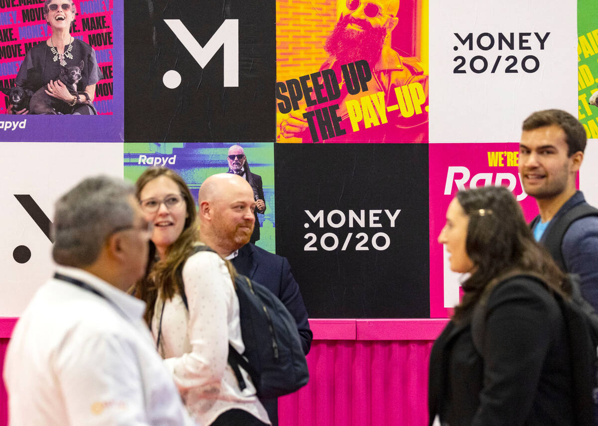 Conferencegoers arrive at Money 20/20 conference and exhibition at the Venetian Convention Cent ...