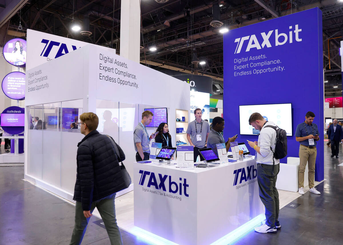 Conferencegoers at TAXbit booth during Money 20/20 conference and exhibition at the Venetian Co ...
