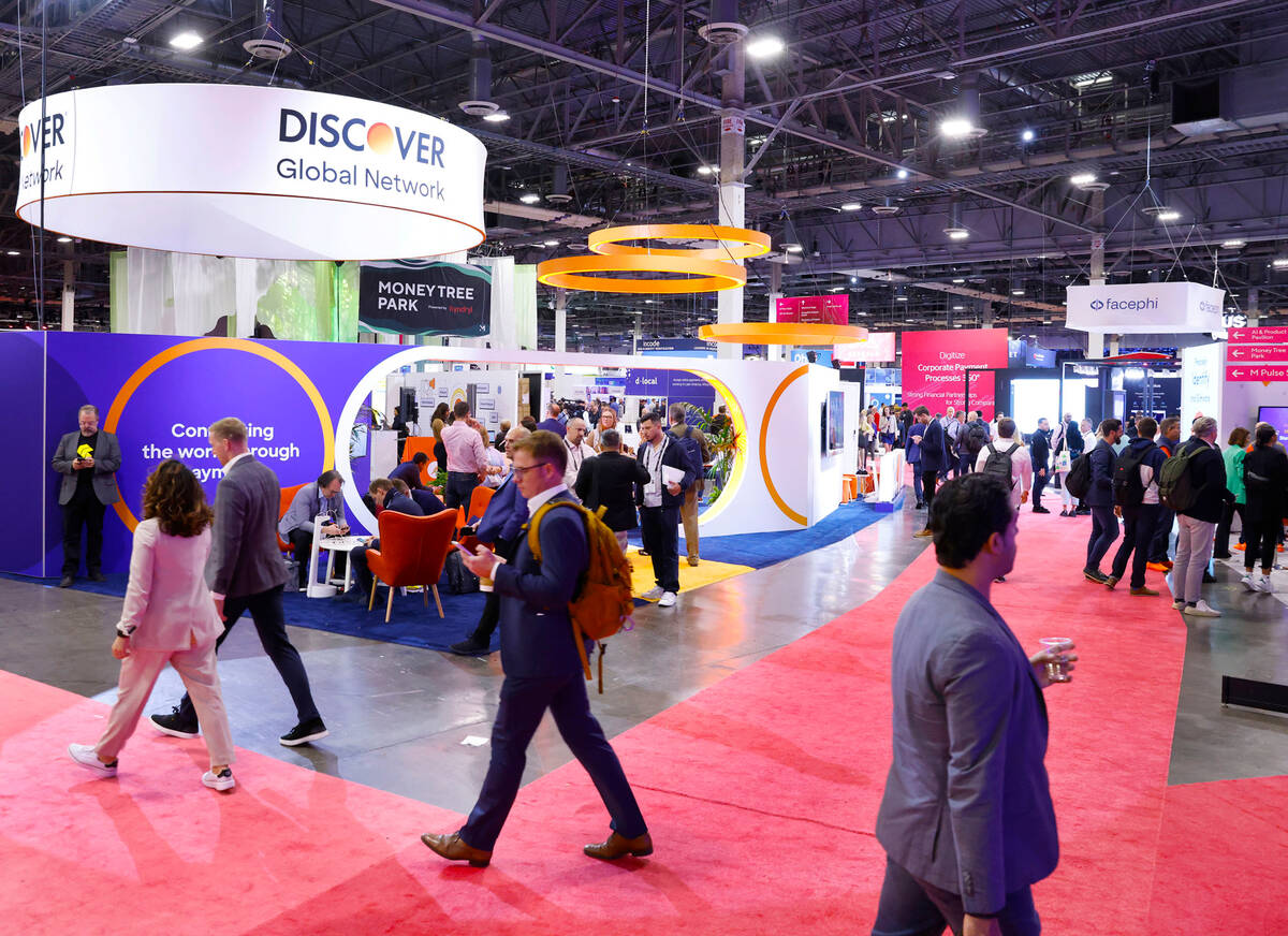 Conferencegoers arrive at Money 20/20 conference and exhibition at the Venetian Convention Cent ...
