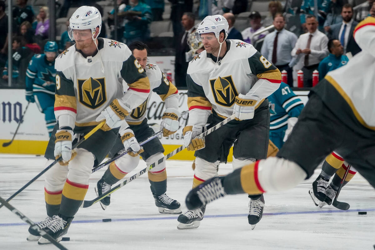 Vegas Golden Knights center Phil Kessel (8) and teammates warm up before an NHL hockey game aga ...