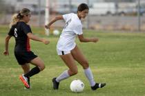 Valley High School's America Ortega Espinoza (6) and Spring Valley's Brylie Tavares-Bright (6) ...