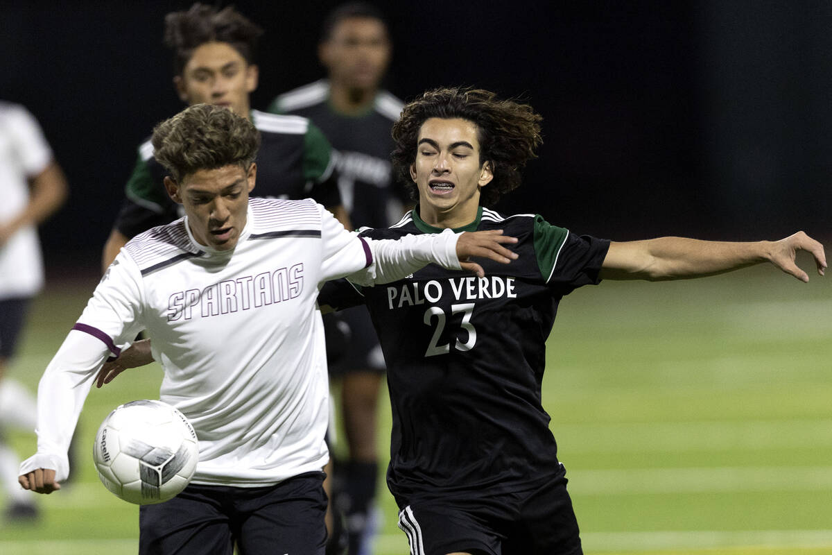 Cimarron-Memorial’s Jonathon Walter dribbles against Palo Verde’s Gannon Gaudioso ...