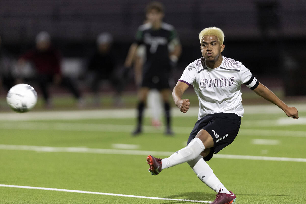 Cimarron-Memorial’s Andy Gonzalez attempts a goal against Palo Verde during a boys high ...