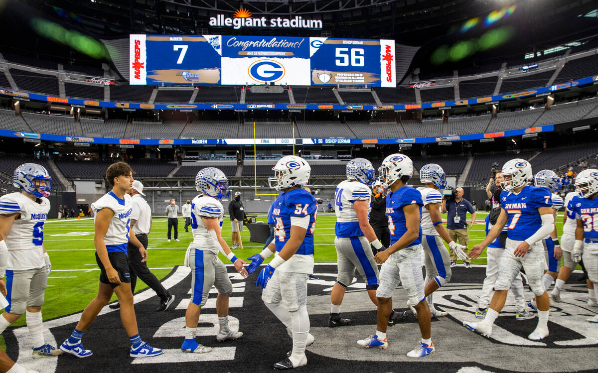 Bishop Gorman and McQueen players shake hand during following the second half of their Class 5A ...