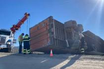 Crews attempt to move a semi on U.S. 95 near Las Vegas on Wednesday, Oct. 26, 2022. (NHP via Tw ...