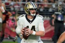 New Orleans Saints quarterback Andy Dalton (14) drops back to pass against the Arizona Cardinal ...