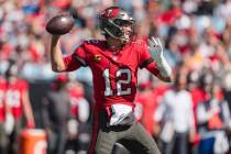 Tampa Bay Buccaneers quarterback Tom Brady (12) plays against the Carolina Panthers during an N ...