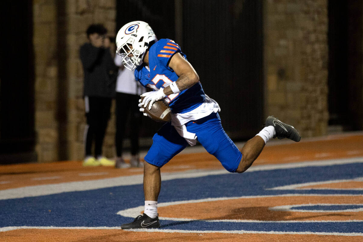 Bishop Gorman’s Trech Kekahuna (23) catches a touchdown pass during a high school footba ...