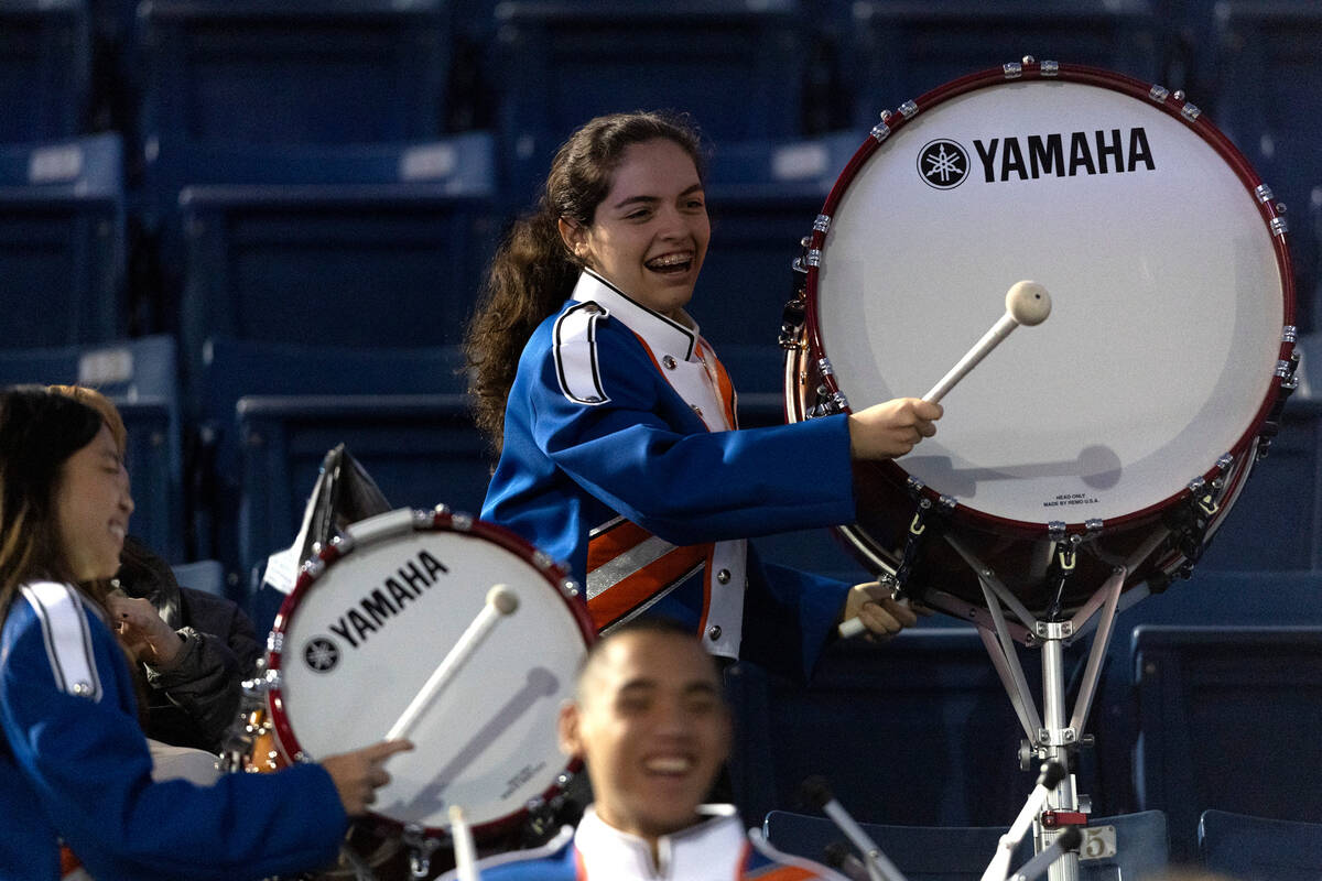 Bishop Gorman’s band has fun while cheering their team on during a high school football ...