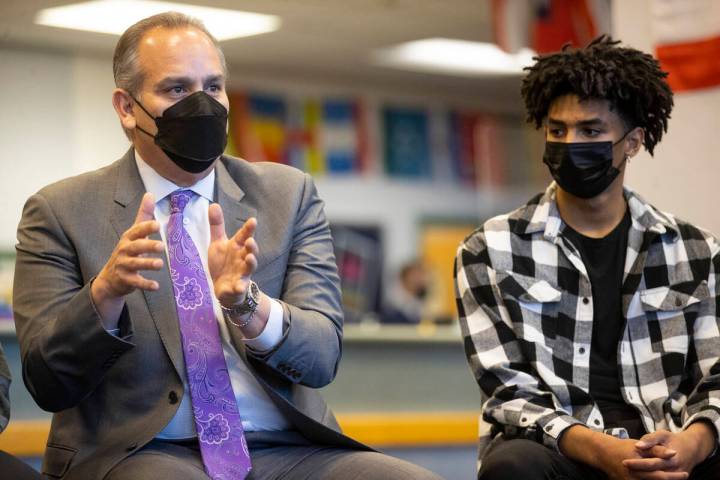 Clark County School District Superintendent Jesus Jara, left, with student Alijah Adem, speaks ...