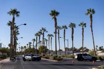 Las Vegas police officers investigate the scene of a fatal accident at the 5700 block of Centen ...