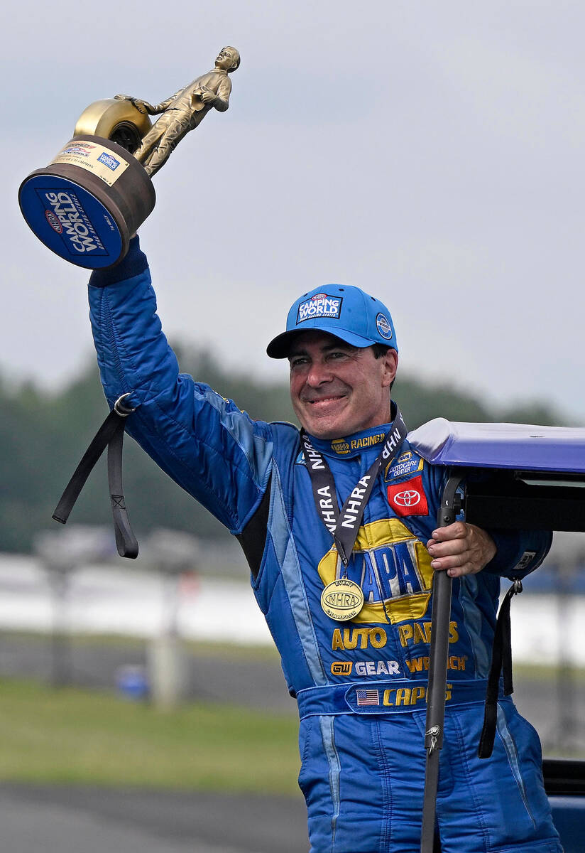Ron Capps is seen in September after winning the Funny Car title at the NHRA event in Brownsbur ...