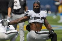 Raiders linebacker Denzel Perryman (52) stretches before an NFL game against the Los Angeles Ch ...