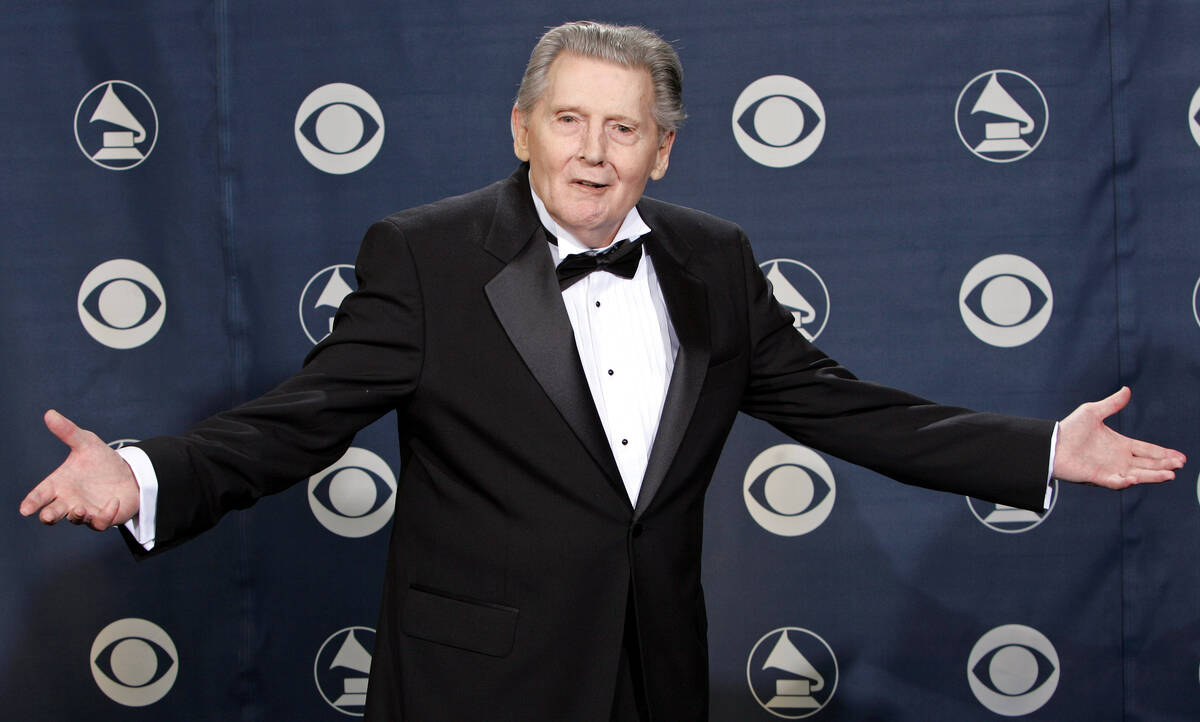 FILE - Lifetime achievement award winner Jerry Lee Lewis poses for photographers at the 47th An ...