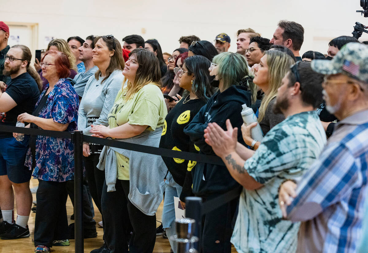 People respond to U.S. Senator Bernie Sanders at East Las Vegas Community Center during a rally ...