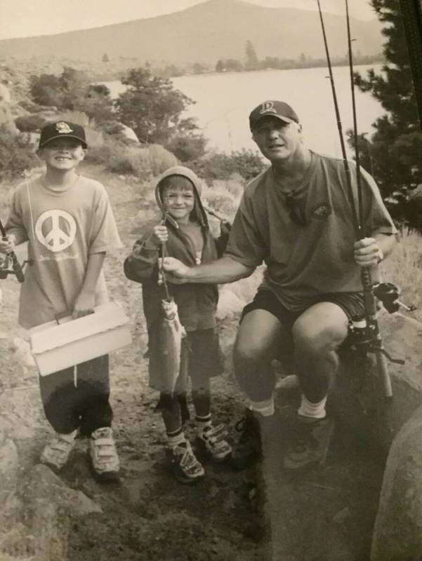 Keith Rogers with his sons Evan, left, and Bryce at Convict Lake in California in 2003. (Bryce ...