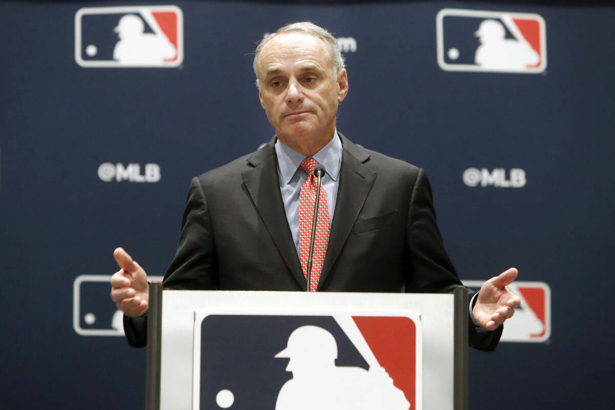 FILE - In this Nov. 21, 2019, file photo, baseball commissioner Rob Manfred speaks to the media ...