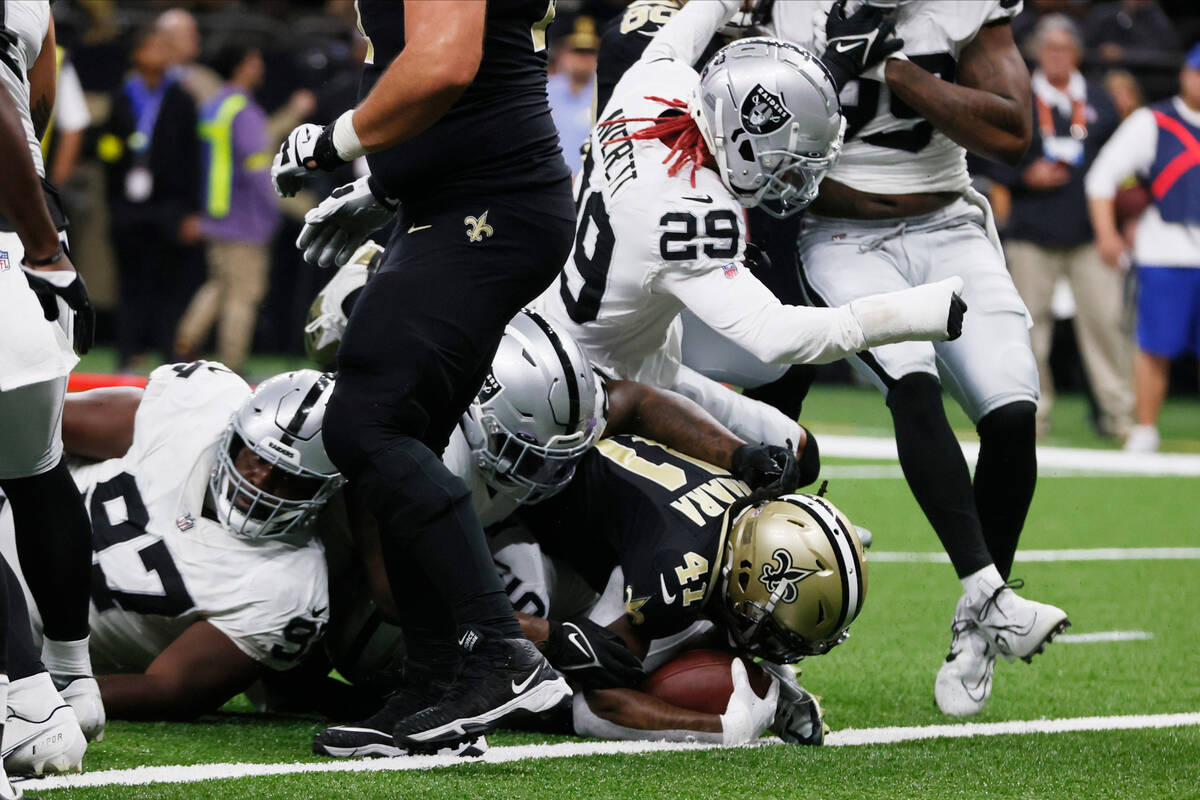 New Orleans Saints running back Alvin Kamara (41) rolls into the end zone for a touchdown durin ...