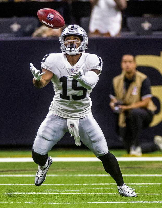 Raiders wide receiver DJ Turner (19) bobbles a kickoff return versus the New Orleans Saints dur ...