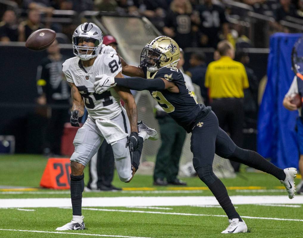 Raiders wide receiver Keelan Cole (84) can’t haul in a pass that is defended by New Orle ...
