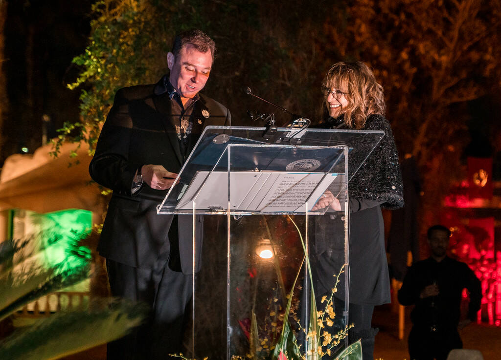 The Neon Museum Executive Director Aaron Berger and honoree Barbara Molasky are shown at Siegfr ...