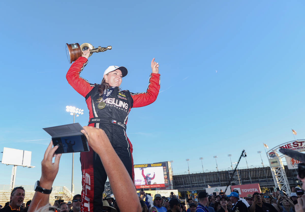 Erica Enders enters the stage after winning the pro stock Nevada Nationals for NHRA at the Las ...