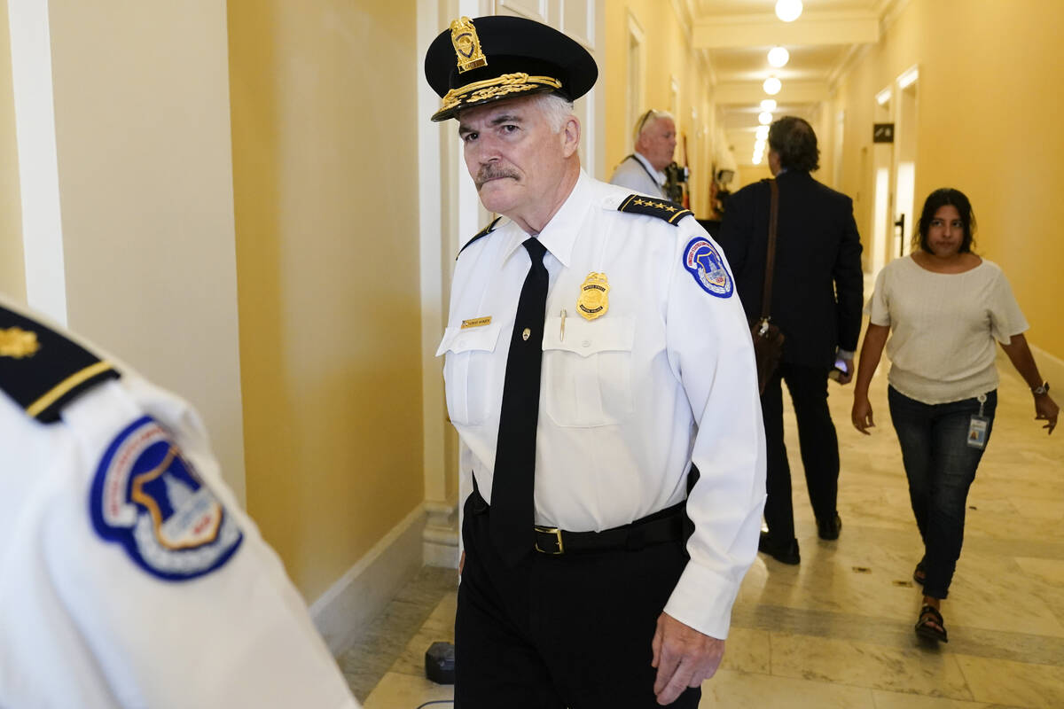 FILE - U.S. Capitol Police Chief J. Thomas Manger walks outside the room where the House select ...