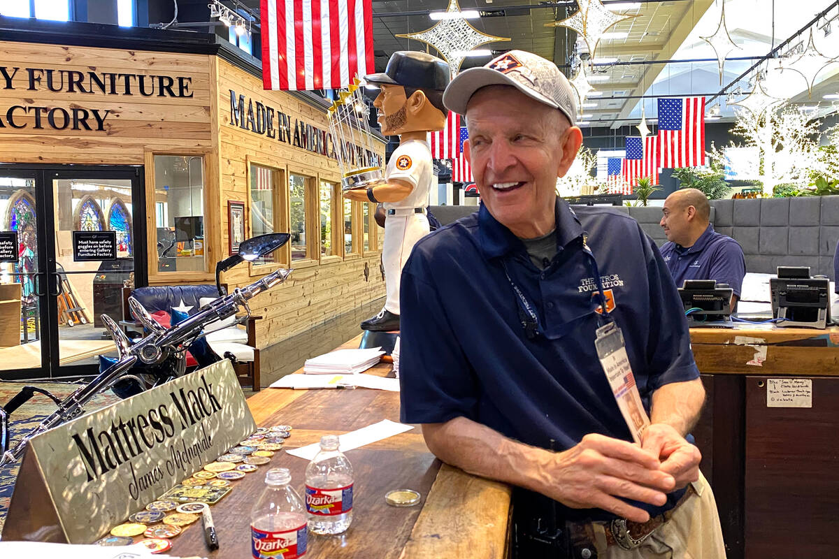 Houston furniture store owner Jim "Mattress Mack" McIngvale, 68, mans the counter in ...