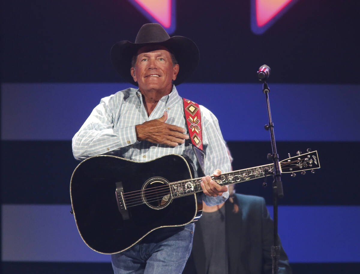 Country superstar George Strait’s charm can make a 20,000-seat arena seem downright cozy. (Ja ...