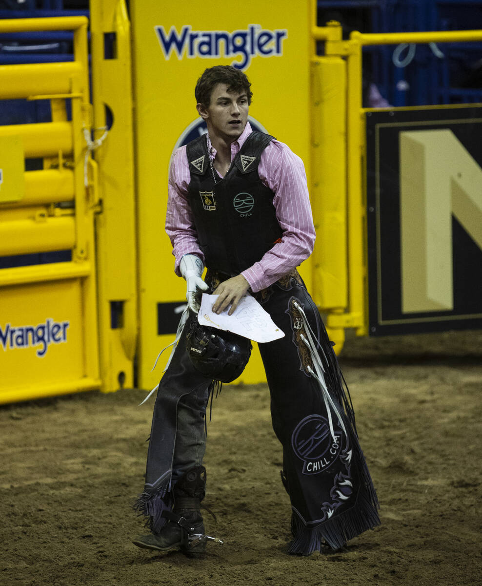 Creek Young of Rogersville, Mont., after being thrown from CliffHanger during the fifth round o ...