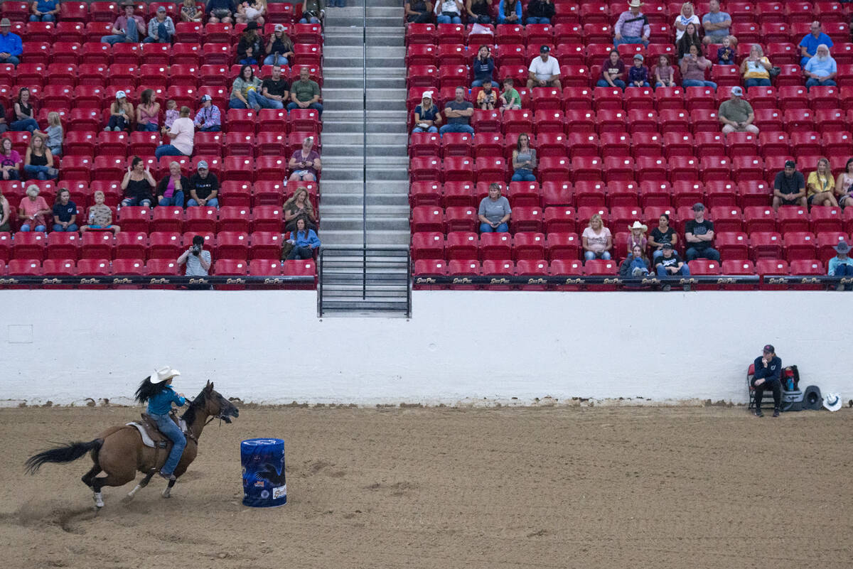 Kate Richardson of Imperial, Calif., scores a time of 18.731 seconds during a Sept. 2 barrel ra ...