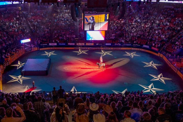 Drake Milligan sings the National Anthem at the start of the opening night of the 2021 Wrangler ...