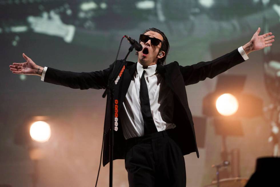 Matthew Healy of the 1975 performs at the Reading Music Festival, England, Sunday, Aug. 28, 202 ...