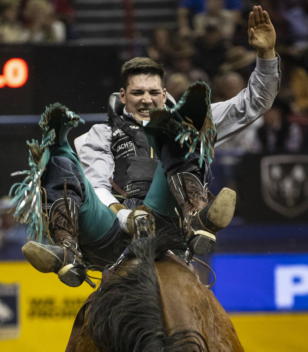 Jess Pope of Waverly, Kan., rides Irish Eyes in Bareback Riding during the sixth round of the W ...
